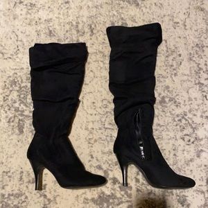 Black heeled boots, size 9.